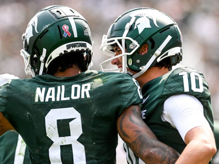 Michigan State's Jalen Nailor and Payton Thorne